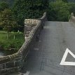 P011 ... Pont Fawr (Y Bont Fawr) built of roughly coursed local slate and gritstone rubble, the steeply ramped Llanrwst Bridge, with its three segmental arches and...