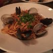 P005 ... Seafood fettucine - shrimp, clams, and mussels, green onions and chopped celery in a slightly spicy tomato cream sauce...