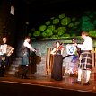 P013-027 ... entertainers of the Scottish evening - the host singer/musician, the fiddlers-singer... (some traditional musical instruments of Scotland being accordion,...