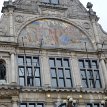 P009 Painted tympanum by Constant Montald (1862–1944), a Belgian painter, muralist, sculptor and teacher. The tympanum’s allegorical scene shows Apollo, on his...