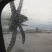 P001 A rainy early morning at Dublin Airport - onboard the propeller plane flying us to Glasgow...