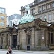 P020 ... the south side of George Square now an exclusive residential development; this Jigsaw clothing store housed in an 1896 Victorian building that's used to be...