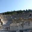 P019 ... entrances at both sides of the stage; upper part of the theater decorated with red granite Corinthian style pillars...