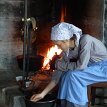 P027 ... daily life in the 1890s at an Øygarden farmhouse, housewife cooking porridge...