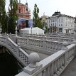 P018 LjubljanaTriple Bridge, a group of three bridges across the Ljubljanica River; connecting Ljubljana's historical medieval town on one bank, and the modern city...