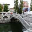 P019 Another view of Triple Bridge; Statue of France Prešeren and the Galerija Emporium to the right of photo, neighboring the Franciscan Church of the Annunciation