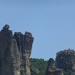 P003 ... rock pinnacles of deltaic origin rising starkly over 1300 ft above the Peneas valley; these immense, solid rocks, split by earthquakes, weathered by water...