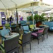 019 - P1180978 Colorful outdoor seating of a restaurant...