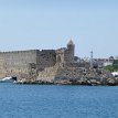 P000c The fortifications of the town of Rhodes are shaped like a defensive crescent around the Medieval town and consist mostly in a modern fortification composed of...