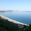 P005 ... uninterrupted coastline of white-golden beaches... viewed from the Saint Stefanos Hill (also known as Monte Smith)...