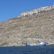 P006 ... from the Athinios Port terminal, coach buses climbing the cliffy winding road, up to the main road, along a scenic route to Fira, continuing to the...