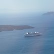 P006a01 ... from our seat in the bus... zoom-in view of the caldera where our ship anchored off Nea Kameni near or opposite to Athinios Port, the main ferry port of...