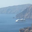 P007 ... another cruise ship anchored in the lace-like caldera off the old port (Skala pier) below the village town of Fira...