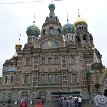 P002 ... a compact five-domed structure, with three semicircular apses at the east end and a massive pillar-like bell tower at the west end... the five central domes...