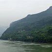 P020 ... a rapid bending turn coming up... perilous Xiling Gorge often stands shrouded in mists, known for its lofty and spectacular mountains on both banks, and in...